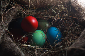 Easter painted eggs on burlap