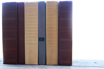 books standing on a table