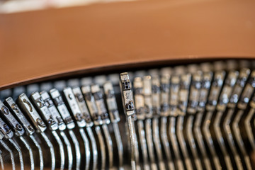 Close up of old fashioned vintage typewriter typebars