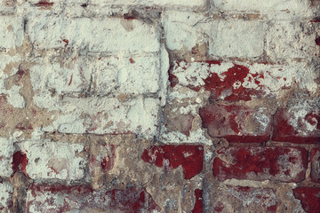 shabby brick wall street