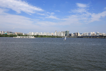 Fototapeta premium The Seoul skyline from across the Han River in Seoul, Korea.