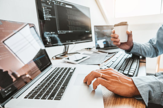 Developing programmer Development Website design and coding technologies working in software company office