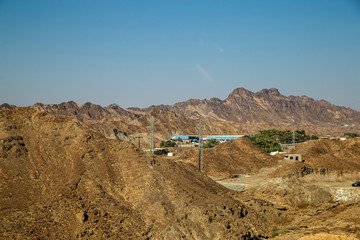 industrial buildings in the mountains in the arab emirates