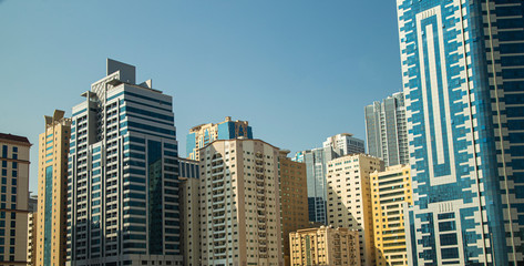 Fototapeta na wymiar windows and walls of high-rise buildings in dubai