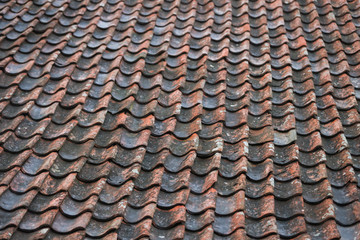 Red, orange, old countryside house roof pattern texture.