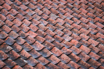 Red, orange, old countryside house roof pattern texture.