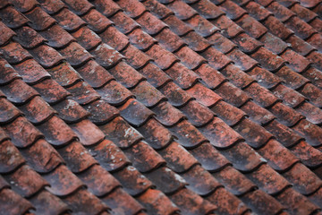 Red, orange, old countryside house roof pattern texture.