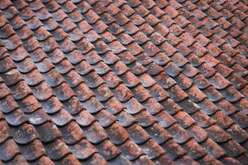 Red, orange, old countryside house roof pattern texture.