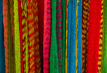 Close-up of multi-colored hammocks