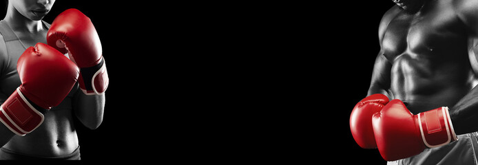 Cropped of man and woman in red boxing gloves