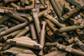 Wooden constructor. Details from a tree for a game close-up. Build the constructor. Child development in kindergarten or school