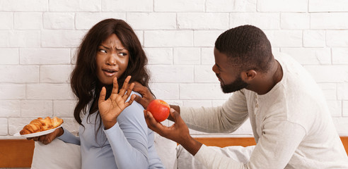 Man begging his pregnant wife eat fruits