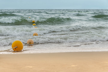 Naklejka premium Swimming area for people in sea fenced with buoys