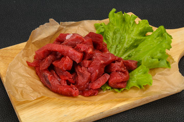 Raw beef meat sliced for cooking