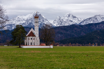 Colomans Church with the Alps in the background. Germany, Bavaria.