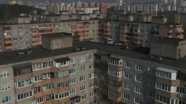 Typical house of the times of the ussr. Old prefabricated house. Old district of the city. Russia. The house is gray.