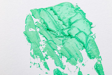 Aqua Menthe color 2020. Green paint strokes. Texture