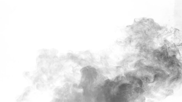 Slow motion of black smoke isolated on white background. Filmed on high speed cinema camera.