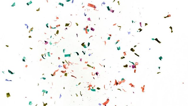 Super slow motion of flying coloured confetti isolated on white background. Filmed on high speed cinema camera.