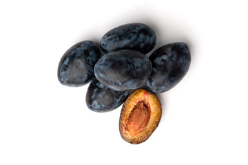 Fresh plum isolated on white background.