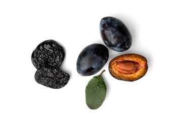 Fresh plum and prune isolated on white background.