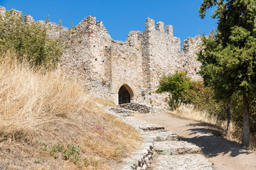 The Platamon Castle is a Crusader castle in northern Greece - Macedonia, Pieria. It is located southeast of Mount Olympus, The tower is an imposing medieval fortress. - obrazy, fototapety, plakaty