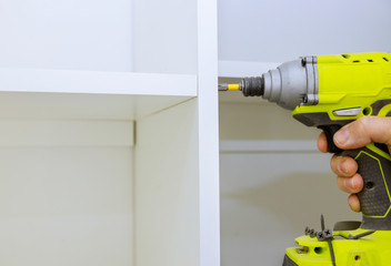 Installing a screwdriver handle wooden shelves on wall