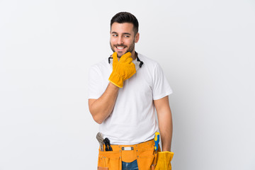 Craftsmen or electrician man over isolated white background thinking an idea