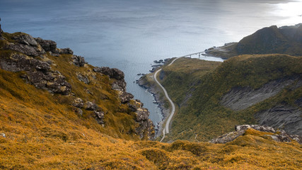 Lofoten Islands, Norway, panorama of  road,  sea ​​and bridges  from the top of the Reinebringen mountain in sunny autumn day