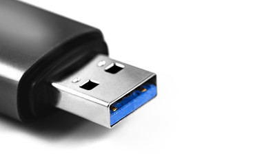 USB 3.0 connector on a white background closeup, macro