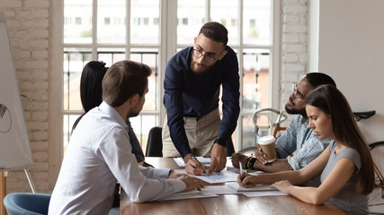Arabian businessman lead team meeting brainstorming with colleagues
