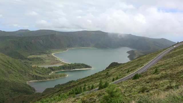 Scenic view of Lagoa do Fogo (Lake of Fire) with the EN5-2A mountain road. Sao Miguel, Azores, Portugal.