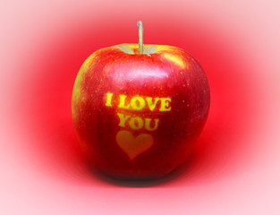 Red Apple with text I LOVE YOU on red background. I love you apple. Apple for Valentine's Day