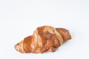 Traditional french croissant isolated on a white background