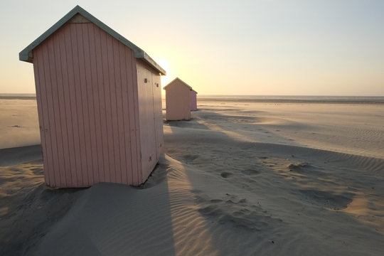 Some small wooden houses on the beach. Bercq a city in the north of France.