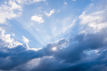 blue sky and white clouds with sun's ray