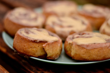 Fresh hot buns Cinnabon with mascarpone cream