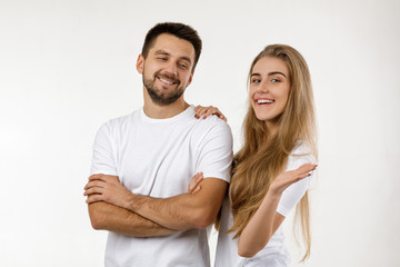 beautiful happy couple looking at camera on white background. st valentines day