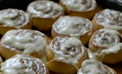 Fresh hot buns Cinnabon with mascarpone cream