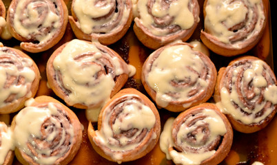 Fresh hot buns Cinnabon with mascarpone cream