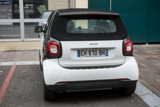 Mulhouse - France - 12 January 2020 - Rear View Of White Smart Car Parked In The Street