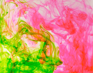 Food color drop and dissolve in water for abstract and background.