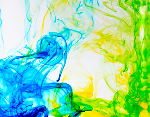 Food color drop and dissolve in water for abstract and background.