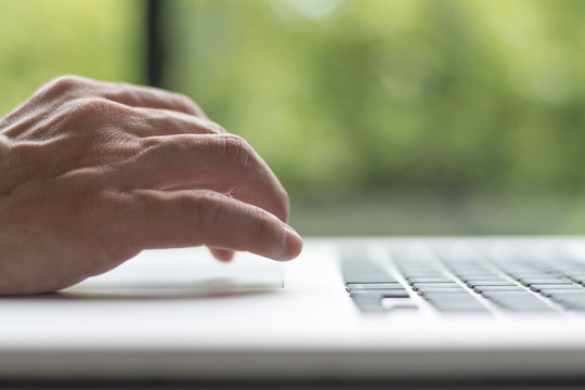 Causal professional Business man using multichannel services with internet wifi 5G on smartphone and online tablet in coffee shop.City lifestyle businessman hands working using mobile phone concept