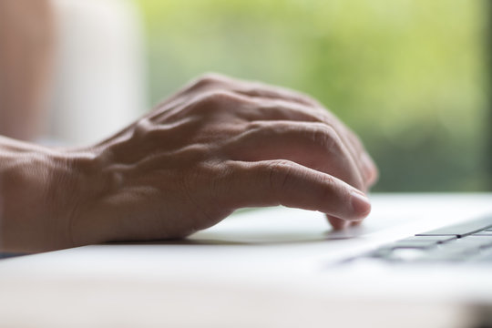 Causal professional Business man using multichannel services with internet wifi 5G on smartphone and online tablet in coffee shop.City lifestyle businessman hands working using mobile phone concept