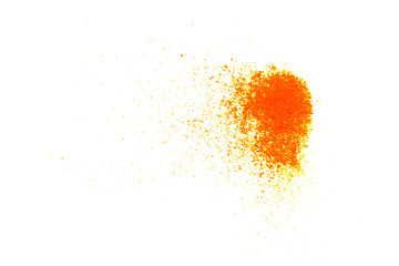 Orange glitter powder and sand color splash or burst isolated on white