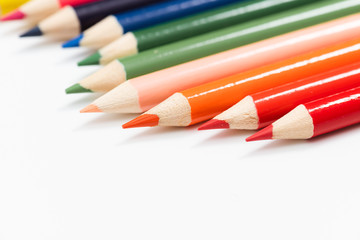 Multi color pencils. the concept of a multinational family and equality in the world.