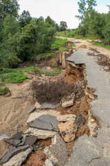 Collapse of the paved road in the forest
