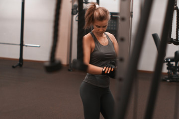 Fototapeta na wymiar caucasian female in gym front view