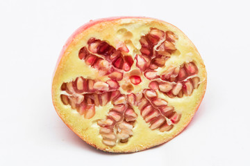 Fresh, natural, sliced fruit of pomegranate .